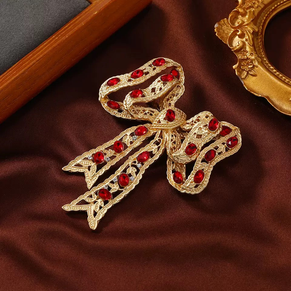 Regal Ruby Bow Brooch