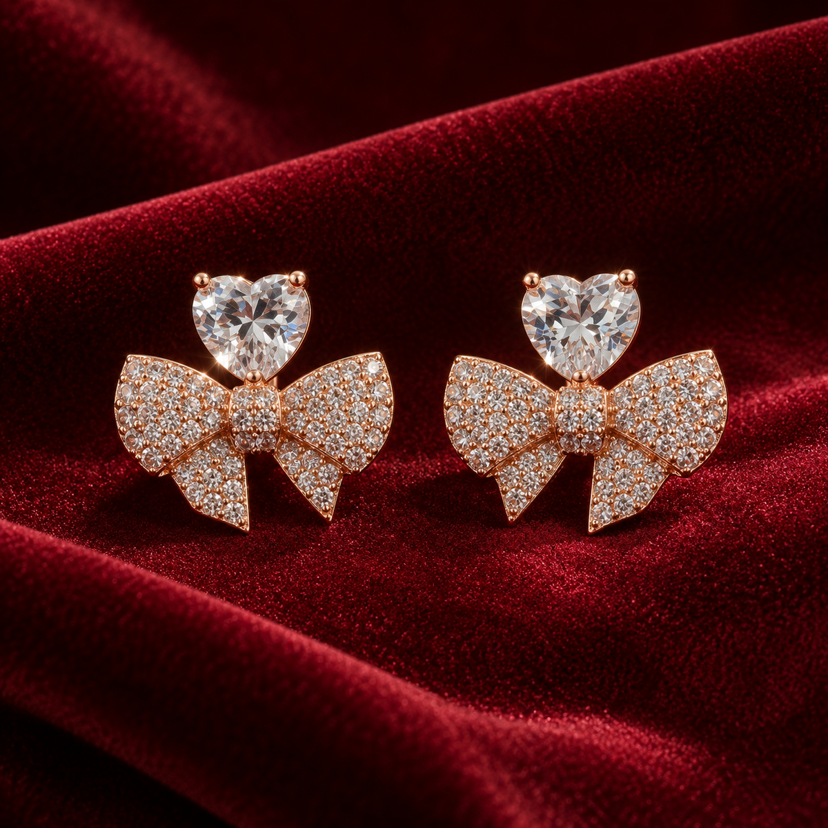 Amorette Heart Bow Stud Earrings in a rose-gold-tone finish