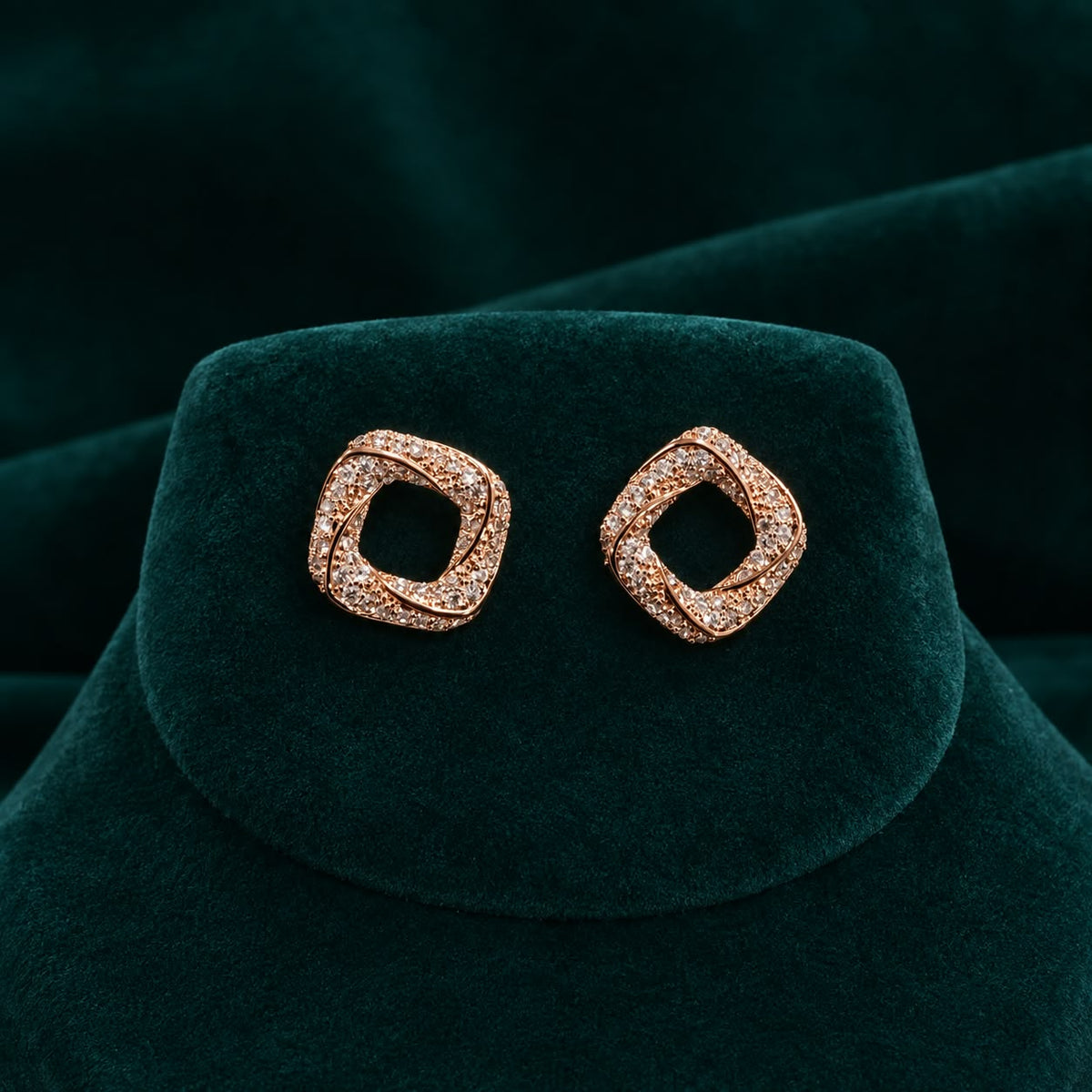 Aurelia Twist Stud Earrings in a rose-gold-tone finish
